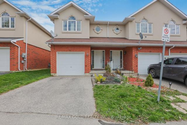 71 - 20 Mcconkey Cres, House attached with 3 bedrooms, 4 bathrooms and 2 parking in Brantford ON | Image 12