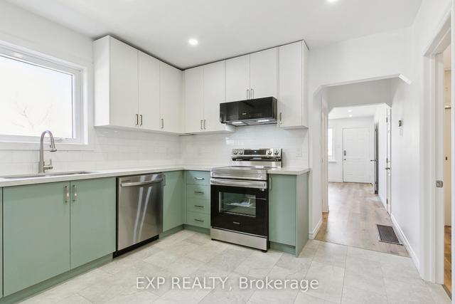 36 Twenty Fourth St, House detached with 3 bedrooms, 2 bathrooms and 2 parking in Toronto ON | Image 2