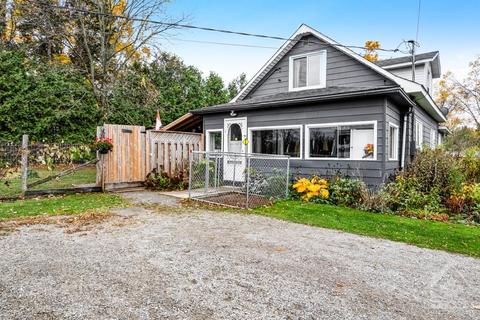 Charmingly upgraded home on 1/2 acre with natural gas heating | Card Image