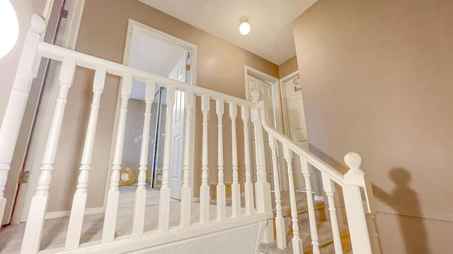 316 Coachway Lane Sw, Home with 3 bedrooms, 2 bathrooms and 2 parking in Calgary AB | Image 13