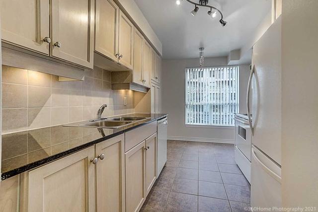 208 - 19 Barberry Pl, Condo with 2 bedrooms, 2 bathrooms and 1 parking in Toronto ON | Image 2