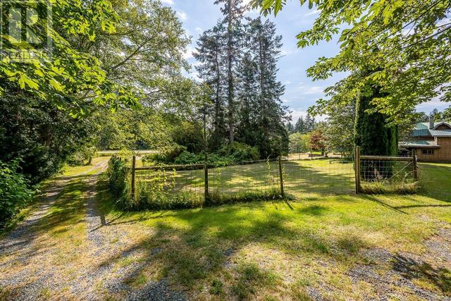 8185 Island Hwy S, House detached with 4 bedrooms, 4 bathrooms and 6 parking in Comox Valley A BC | Image 57