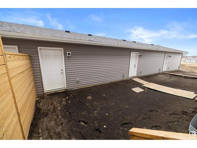 8515 96 Av, House attached with 3 bedrooms, 2 bathrooms and null parking in Morinville AB | Image 33