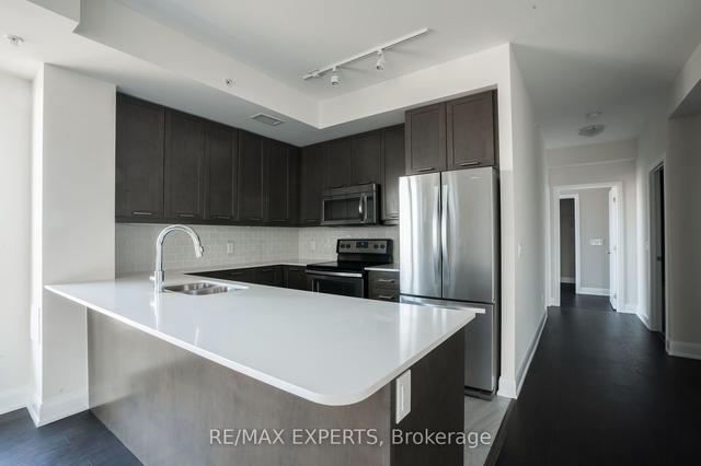 210 - 2480 Prince Michael Dr S, Condo with 2 bedrooms, 2 bathrooms and 2 parking in Oakville ON | Image 25