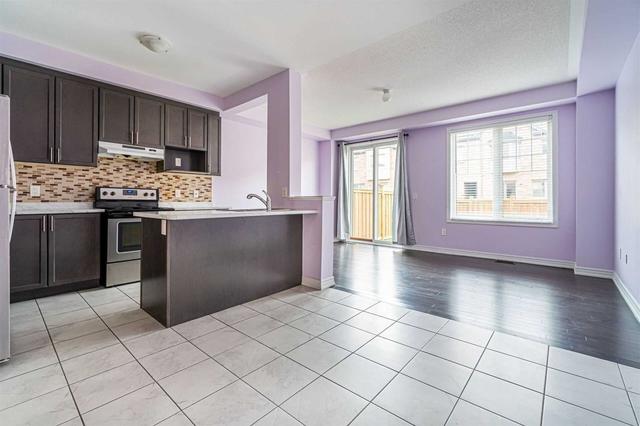 59 Davenfield Circ, House attached with 4 bedrooms, 3 bathrooms and 3 parking in Brampton ON | Image 3