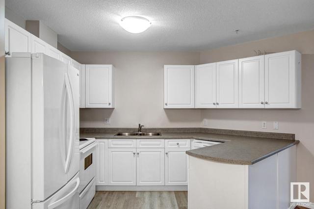 306 - 9930 100 Av, Condo with 2 bedrooms, 2 bathrooms and 1 parking in Fort Saskatchewan AB | Image 17