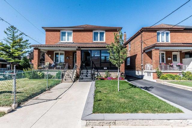 76 Kane Ave, House semidetached with 3 bedrooms, 2 bathrooms and 2 parking in Toronto ON | Image 1