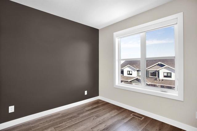 137 Crestridge Common Sw, Home with 3 bedrooms, 2 bathrooms and 4 parking in Calgary AB | Image 22