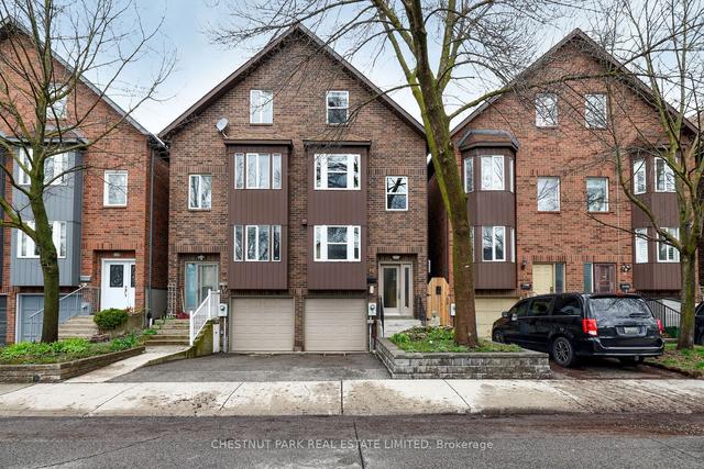 12 Woodrow Ave, House semidetached with 3 bedrooms, 3 bathrooms and 2 parking in Toronto ON | Image 1