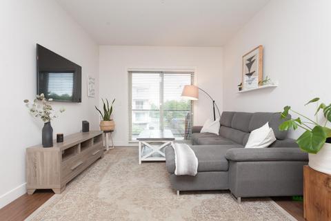 209 - 20219 54a Avenue, Condo with 2 bedrooms, 2 bathrooms and 2 parking in Langley BC | Card Image
