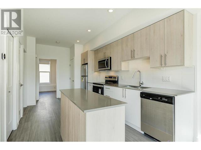 61 - 685 Boynton Place, House attached with 2 bedrooms, 1 bathrooms and 1 parking in Kelowna BC | Image 38
