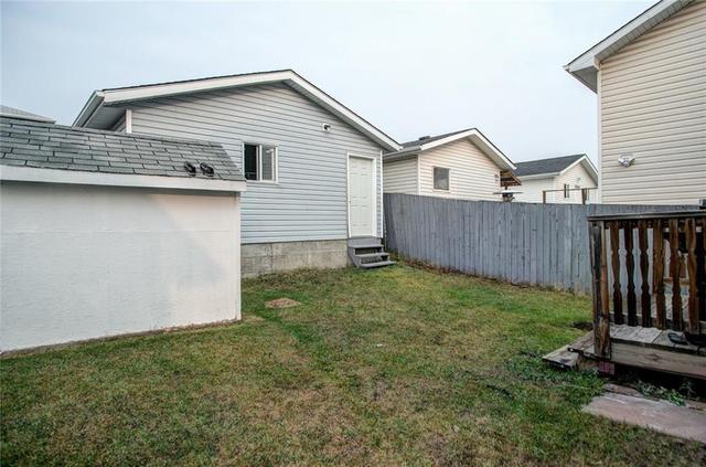 21 Millrise Mews Sw, House detached with 4 bedrooms, 1 bathrooms and 2 parking in Calgary AB | Image 30