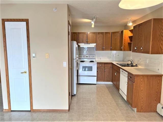 201 - 5600 Sunrise Crescent, Condo with 1 bedrooms, 1 bathrooms and null parking in Olds AB | Image 12