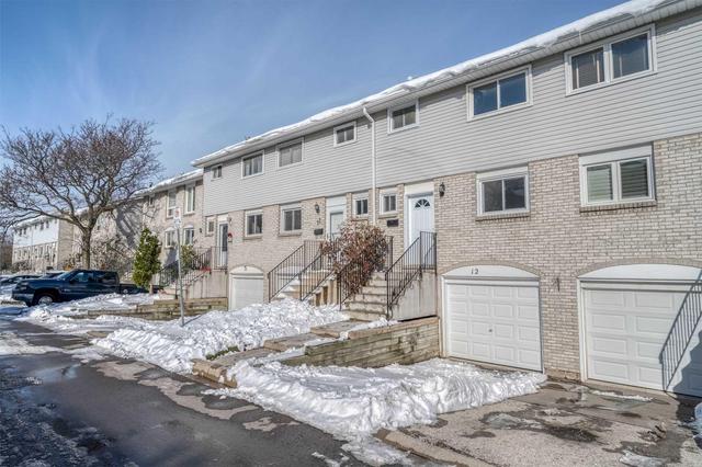 12 - 120 Quigley Rd, Townhouse with 3 bedrooms, 2 bathrooms and 1 parking in Hamilton ON | Image 1