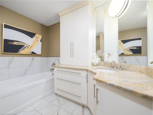l shaped cabinetry in ensuite | Image 9