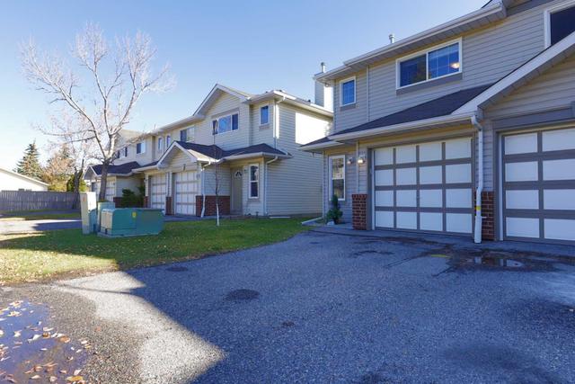 57 Harvest Glen Heights Ne, Home with 2 bedrooms, 1 bathrooms and 2 parking in Calgary AB | Image 2