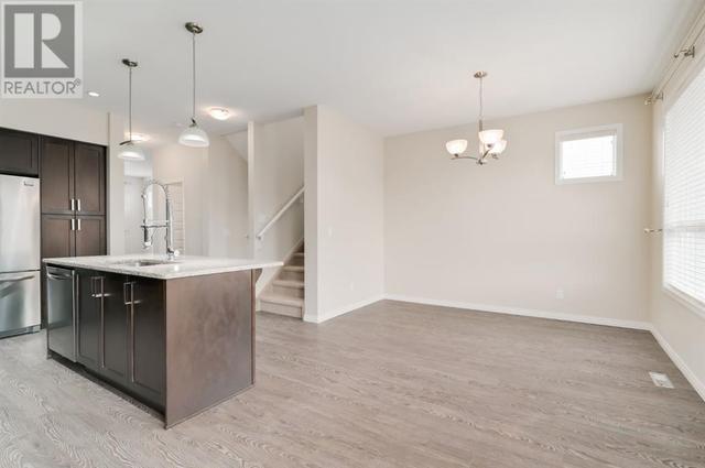605, - 1086 Williamstown Boulevard Nw, House attached with 3 bedrooms, 2 bathrooms and 4 parking in Airdrie AB | Image 10