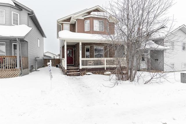 204 Rainbow Creek Drive, House detached with 4 bedrooms, 4 bathrooms and 3 parking in Wood Buffalo AB | Image 1