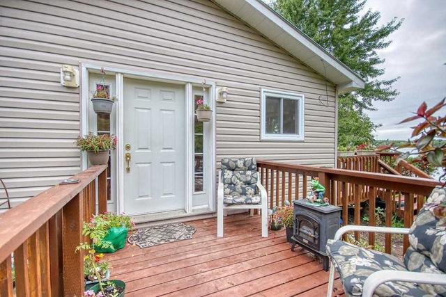 165 Red Cedar Point Rd, House detached with 2 bedrooms, 1 bathrooms and 6 parking in Stone Mills ON | Image 34