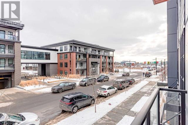 205, - 383 Smith Street Nw, Condo with 2 bedrooms, 2 bathrooms and 1 parking in Calgary AB | Image 22