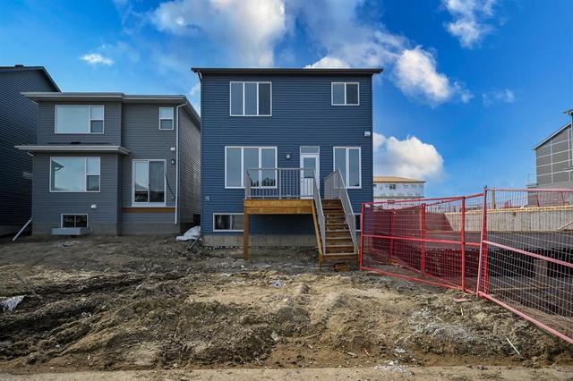 614 Creekstone Circle Sw, House detached with 7 bedrooms, 4 bathrooms and 6 parking in Calgary AB | Image 42