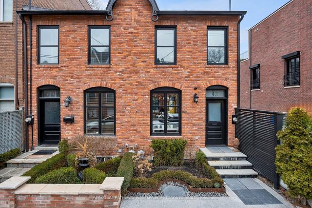 42 Berryman St, House semidetached with 2 bedrooms, 4 bathrooms and 1 parking in Toronto ON | Image 1
