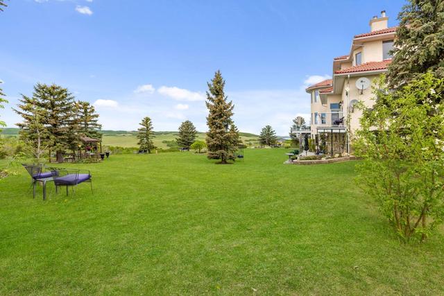 112067 292 Avenue W, House detached with 5 bedrooms, 5 bathrooms and 6 parking in Foothills County AB | Image 6