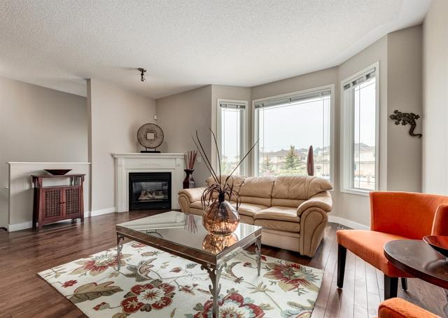 109 Country Hills Gardens Nw, Home with 2 bedrooms, 2 bathrooms and 4 parking in Calgary AB | Image 4