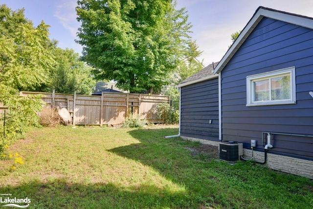 Good sized, flat, clear side yard - note new A/C | Image 6