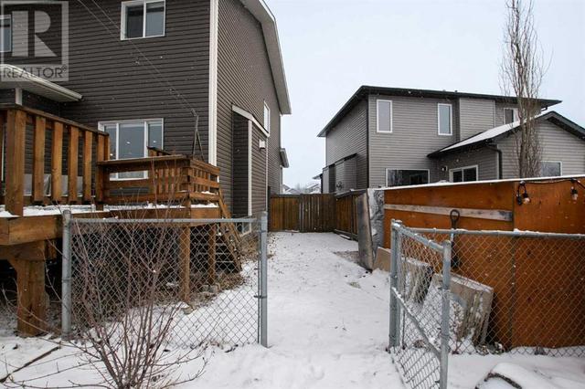 7466 91 Street, House detached with 4 bedrooms, 3 bathrooms and 4 parking in Grande Prairie AB | Image 39