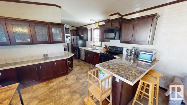 136 Willow Dr, House other with 3 bedrooms, 2 bathrooms and null parking in Breton AB | Image 4