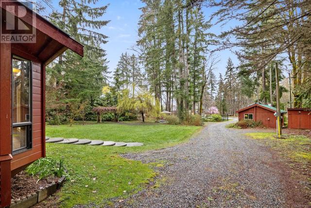 353 Powerhouse Rd, House detached with 4 bedrooms, 5 bathrooms and 10 parking in Comox Valley C (Puntledge   Black Creek) BC | Image 56