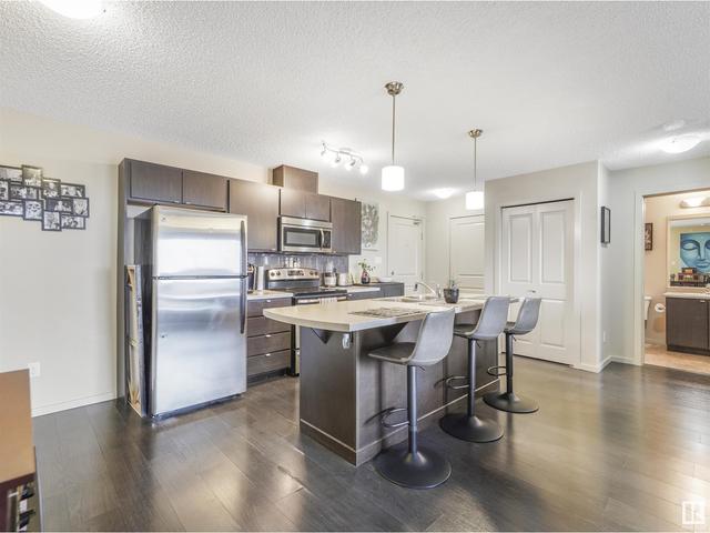 457 - 1196 Hyndman Rd Nw, Condo with 2 bedrooms, 2 bathrooms and 2 parking in Edmonton AB | Image 2