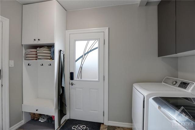 Mud / Laundry Room Leading to Double Car Garage | Image 17