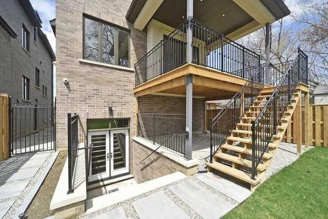 95 Falstaff Ave, House detached with 4 bedrooms, 5 bathrooms and 6 parking in Toronto ON | Image 29