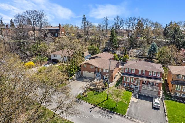 63 Riverside Dr, House detached with 5 bedrooms, 3 bathrooms and 6 parking in Toronto ON | Image 12