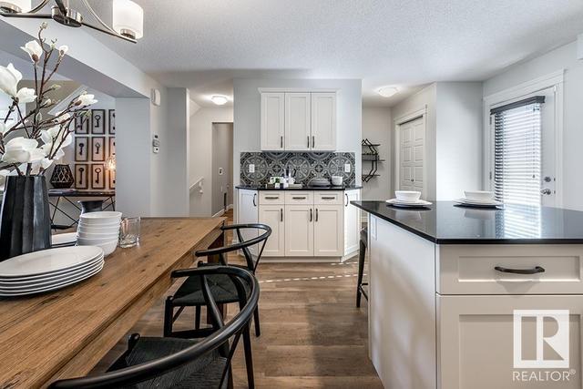 206 Desrochers Bv Sw, House attached with 3 bedrooms, 2 bathrooms and null parking in Edmonton AB | Image 6