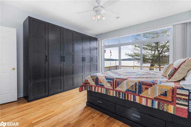 Primary Bedroom with stunning view of the water Triple sliding doors | Image 26