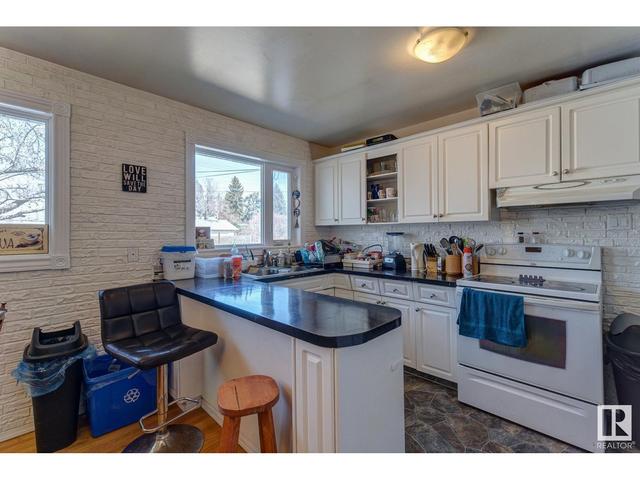 10560 52 Av Nw, House detached with 6 bedrooms, 2 bathrooms and null parking in Edmonton AB | Image 15