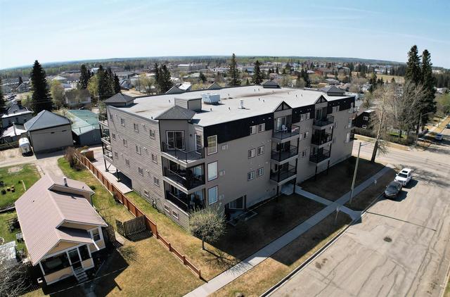 303 - 5037 7 Avenue, Condo with 2 bedrooms, 2 bathrooms and 1 parking in Edson AB | Image 1