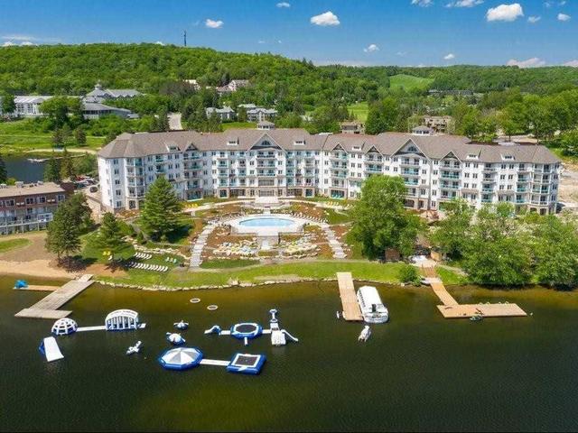 T005 - 25 Pen Lake Point Rd, Condo with 2 bedrooms, 2 bathrooms and 1 parking in Huntsville ON | Image 1