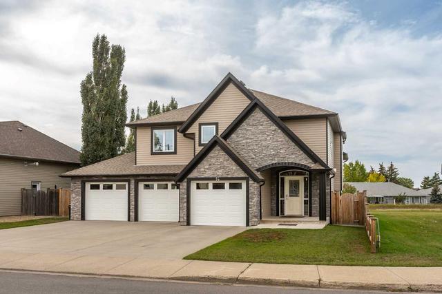 14 Thomas Drive, House detached with 4 bedrooms, 3 bathrooms and 6 parking in Strathmore AB | Image 1