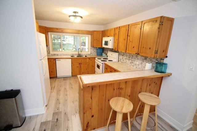 1068 Holiday Park Dr, House detached with 6 bedrooms, 2 bathrooms and 8 parking in Bracebridge ON | Image 38