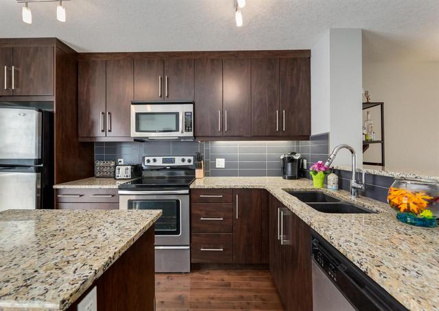 35 Aspen Hills Drive Sw, Home with 3 bedrooms, 3 bathrooms and 1 parking in Calgary AB | Image 14
