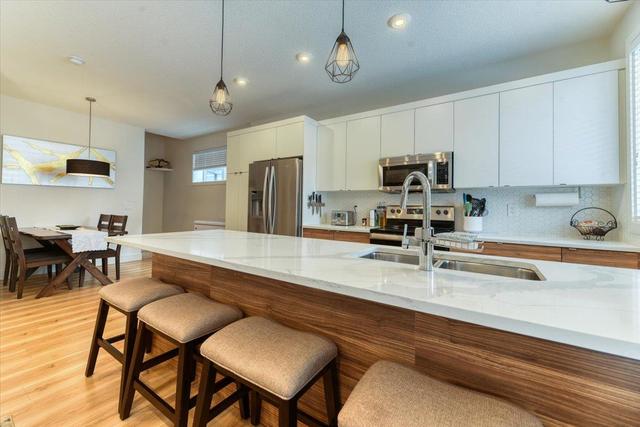 147 Savanna Walk Ne, Home with 3 bedrooms, 2 bathrooms and 2 parking in Calgary AB | Image 12