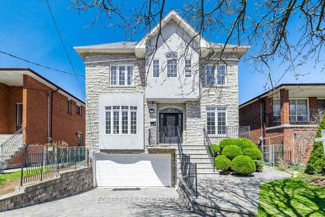 68 Newton Dr, House detached with 4 bedrooms, 5 bathrooms and 4 parking in Toronto ON | Image 1