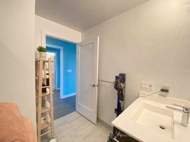 410 - 225 Village Green Sq, Condo with 1 bedrooms, 2 bathrooms and 1 parking in Toronto ON | Image 2