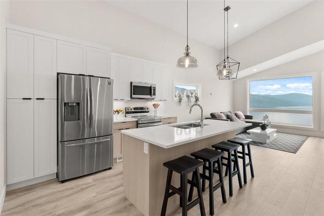1806 Grey Owl Court, House detached with 4 bedrooms, 3 bathrooms and 3 parking in Kelowna BC | Image 19