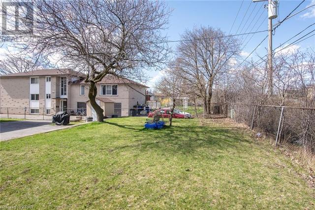 97 Secord Avenue, House other with 8 bedrooms, 3 bathrooms and 6 parking in Kitchener ON | Image 9