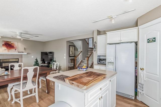 97 Douglas Ridge Circle Se, House detached with 4 bedrooms, 3 bathrooms and 4 parking in Calgary AB | Image 11